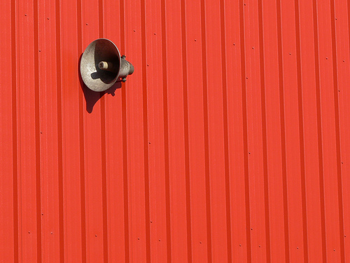 "Listen up - in red" from flickr.com/davidtrindade